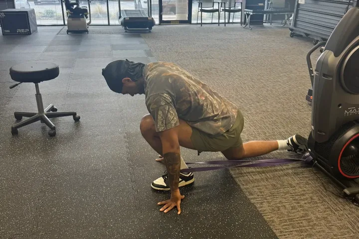 Patient working through a resistance band exercise